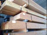 hand hewn timbers with detailed end cuts